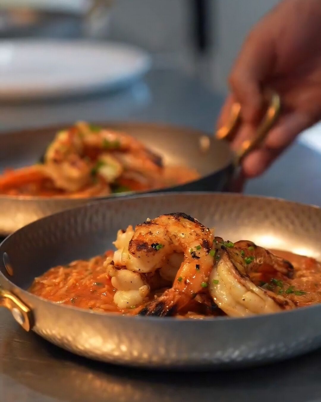 Prawns in tomato sauce, served in the pan