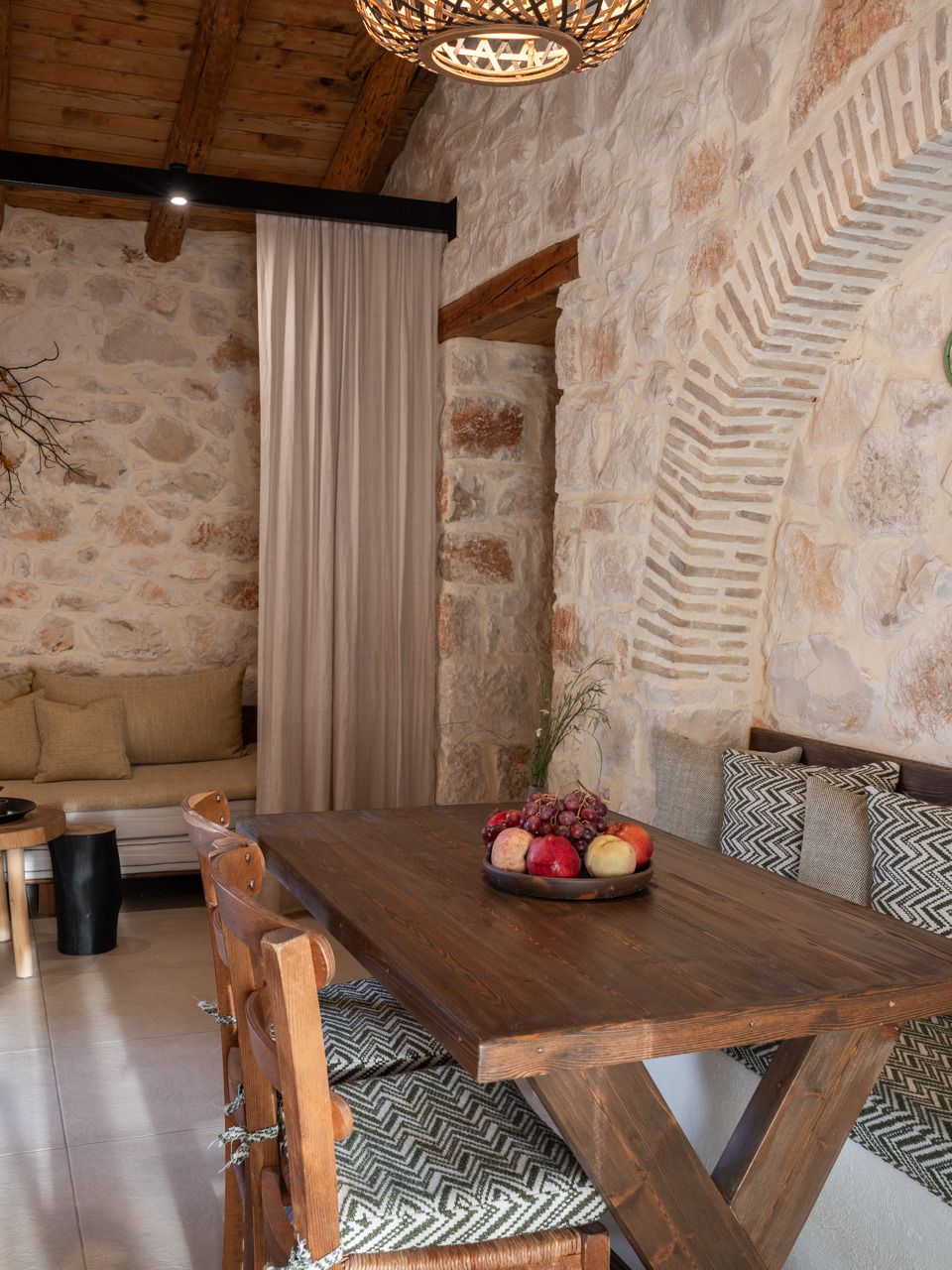 Villa living room with a long wooden dining table